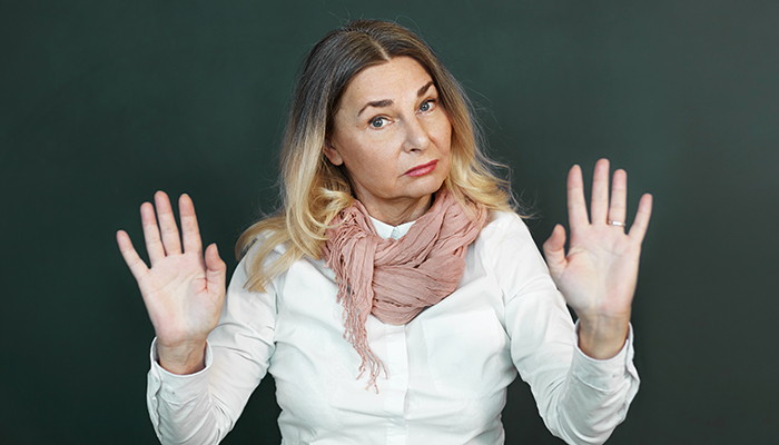 Older woman setting boundaries