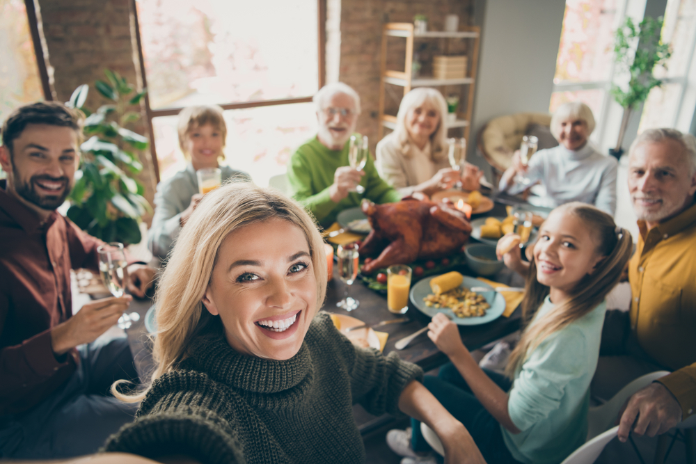 Senior woman enjoying a joyful holiday moment with family