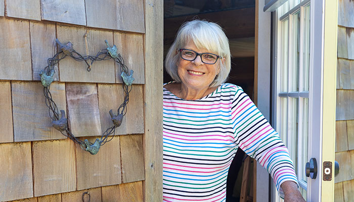 BCFsmilingAtFrontDoor AdobeStock 434643383 700x400