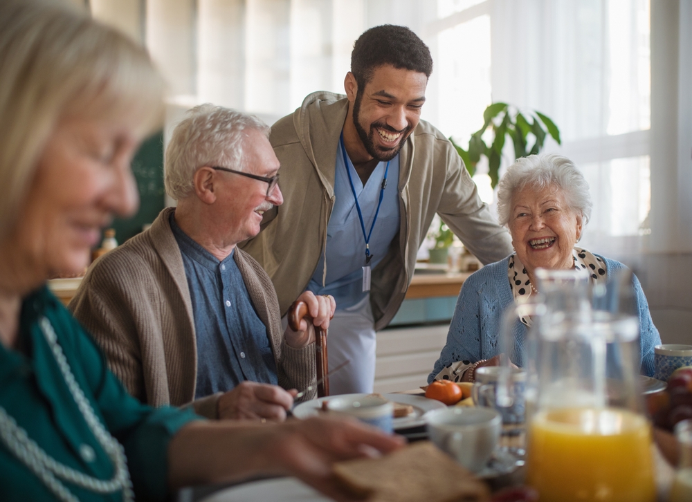 Group,Of,Cheerful,Seniors,Enjoying,Breakfast,In,Nursing,Home,Care