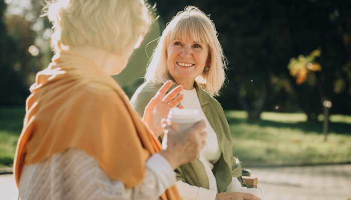 BCFonBenchWithFriend AdobeStock 1668987713 700x400