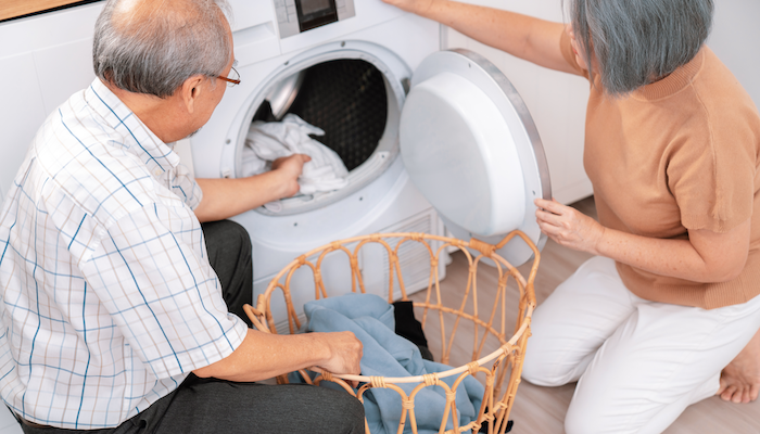 Couple Doing Laundry AdobeStock 611924281 700x400